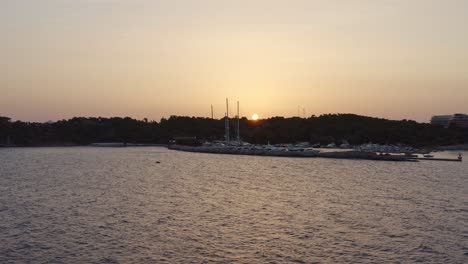 Aerial---sunset-in-Vouliagmeni,-Greece