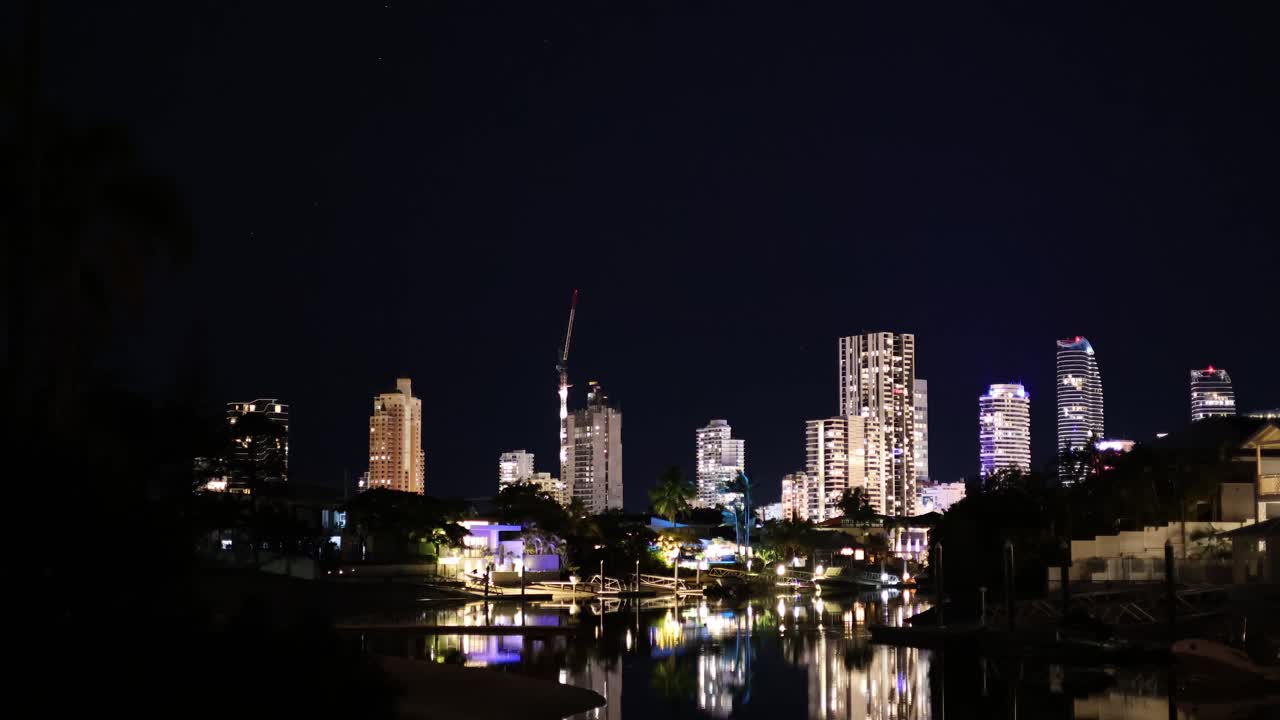 Timelapse of urban skyline as night falls