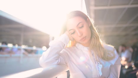 slow motion:beautiful girl enjoys moment while cruising with view of sea on background