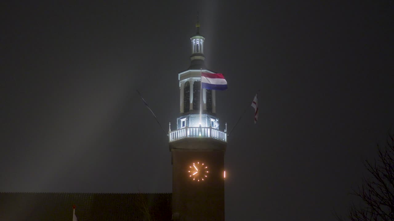 Illuminated Clock Tower at Night