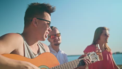 young people having fun on the beach