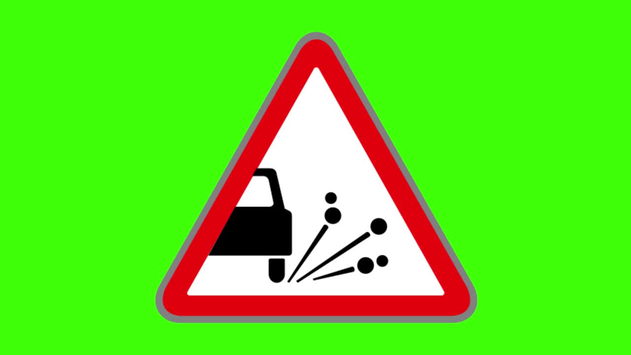 초록색 화면, 도로 표지판 기호, 느슨한 자갈 위험