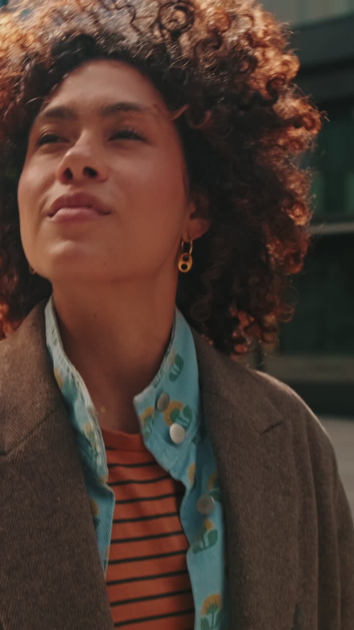 Young Woman Walking Confidently in the City