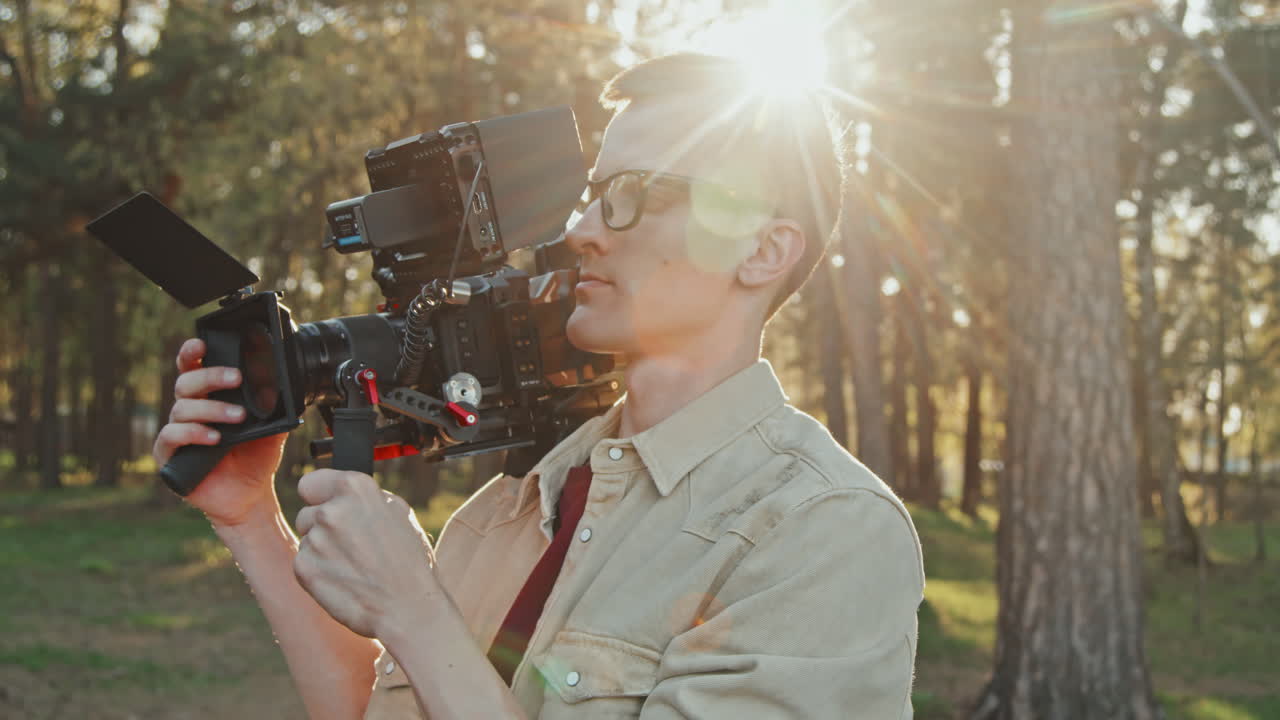 Cameraman Working Outdoors On Sunny Day