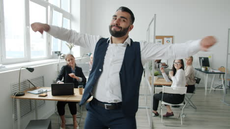 Employees Dancing in Office
