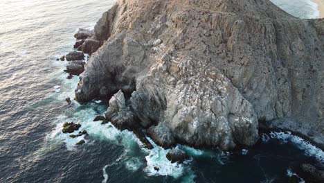 Waves-crashing-against-rocky-shoreline-in-Punta-Lobos,-Baja-California-Mexico