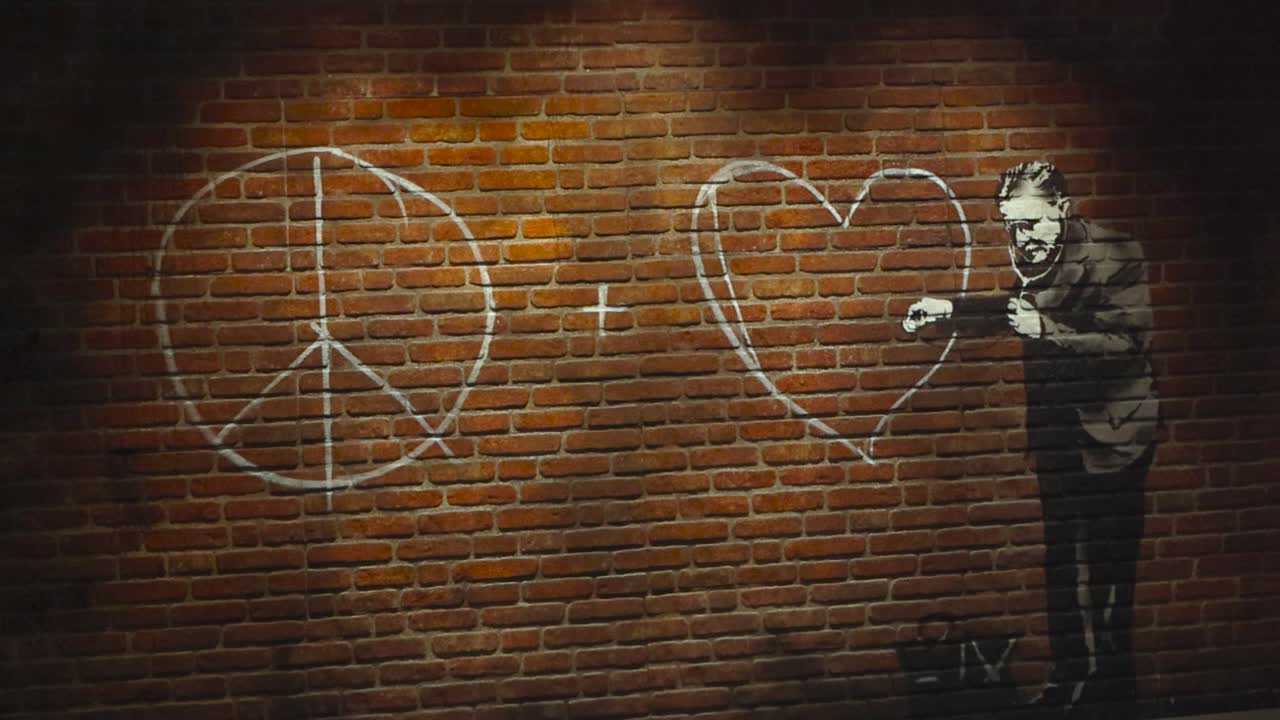 Doctor listening to a heart that is drawn on a red and brown brick wall with crayons or stencil graffiti. Art shows hippy sign + heart and doctor investigating the situation. Bansky art at exhibition.
