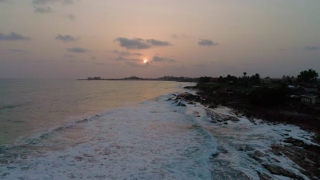a drone sunset shot along the shore