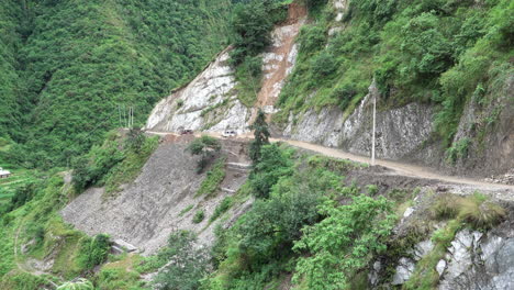 a dangerous road on a cliff in the himalayan foothills of nepal