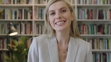 close up portrait of attractive blonde business woman smiling happy wearing stylish suit enjoying successful career