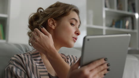 Woman-touching-hair-lips-with-hand.-Girl-getting-ready-for-video-call-closeup.