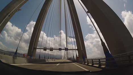 Driving-across-the-world's-largest-suspension-bridge-of-Rio-Antirio-in-Greece