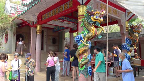 people exploring and gathering at a temple