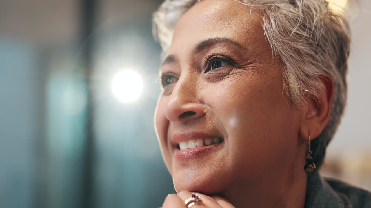 Portrait of a Mature Woman with Silver Hair Smiling