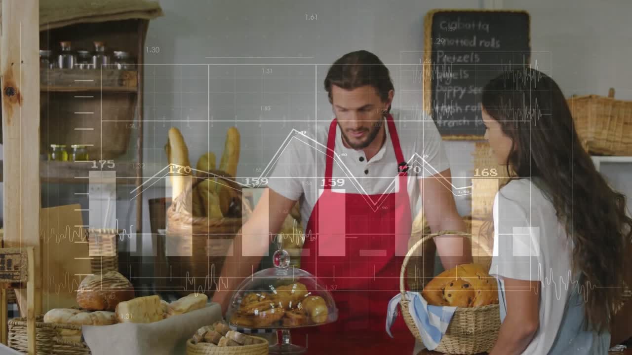 Il personale della panetteria saluta un cliente e, seguendo un gesto, seleziona un dolce con le pinze per l'ordine.