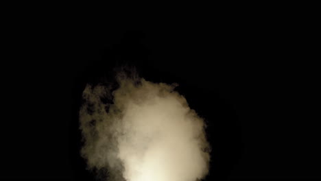 Medium-sized-smoke-cloud-drifting-right-lit-with-pulsating-simulated-fire-light