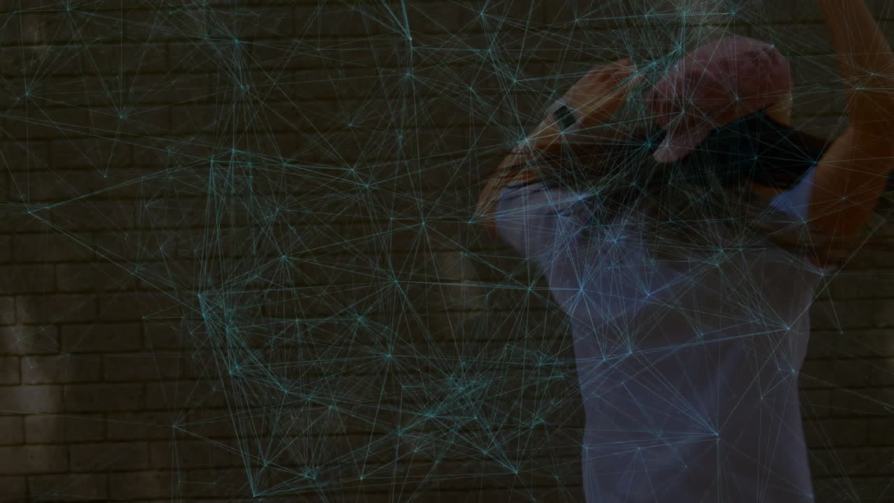 woman lifting arm facing brick wall with holographic blue network overlay showing technology data