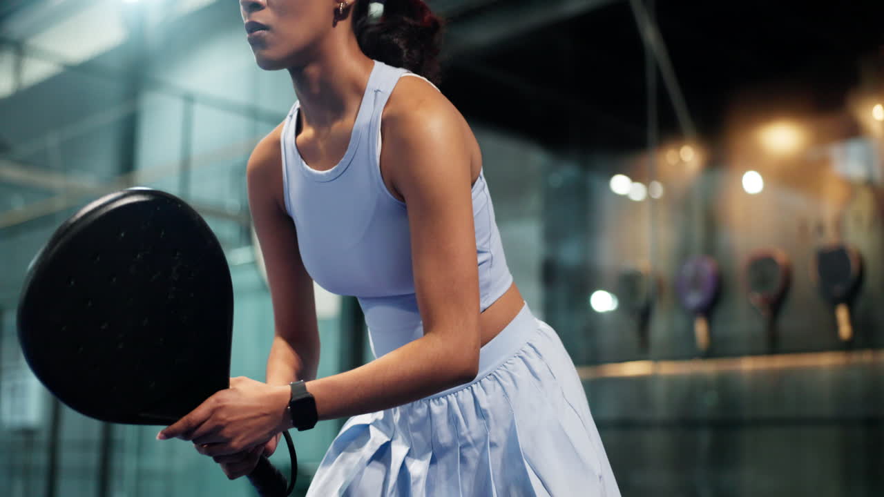 Woman playing paddle tennis