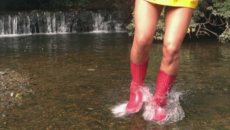 Slow-motion-of-woman-jumping-into-water