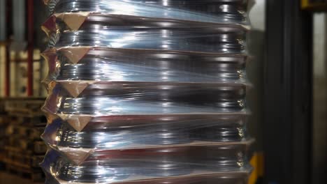 Stacked and Wrapped Industrial Products in Warehouse