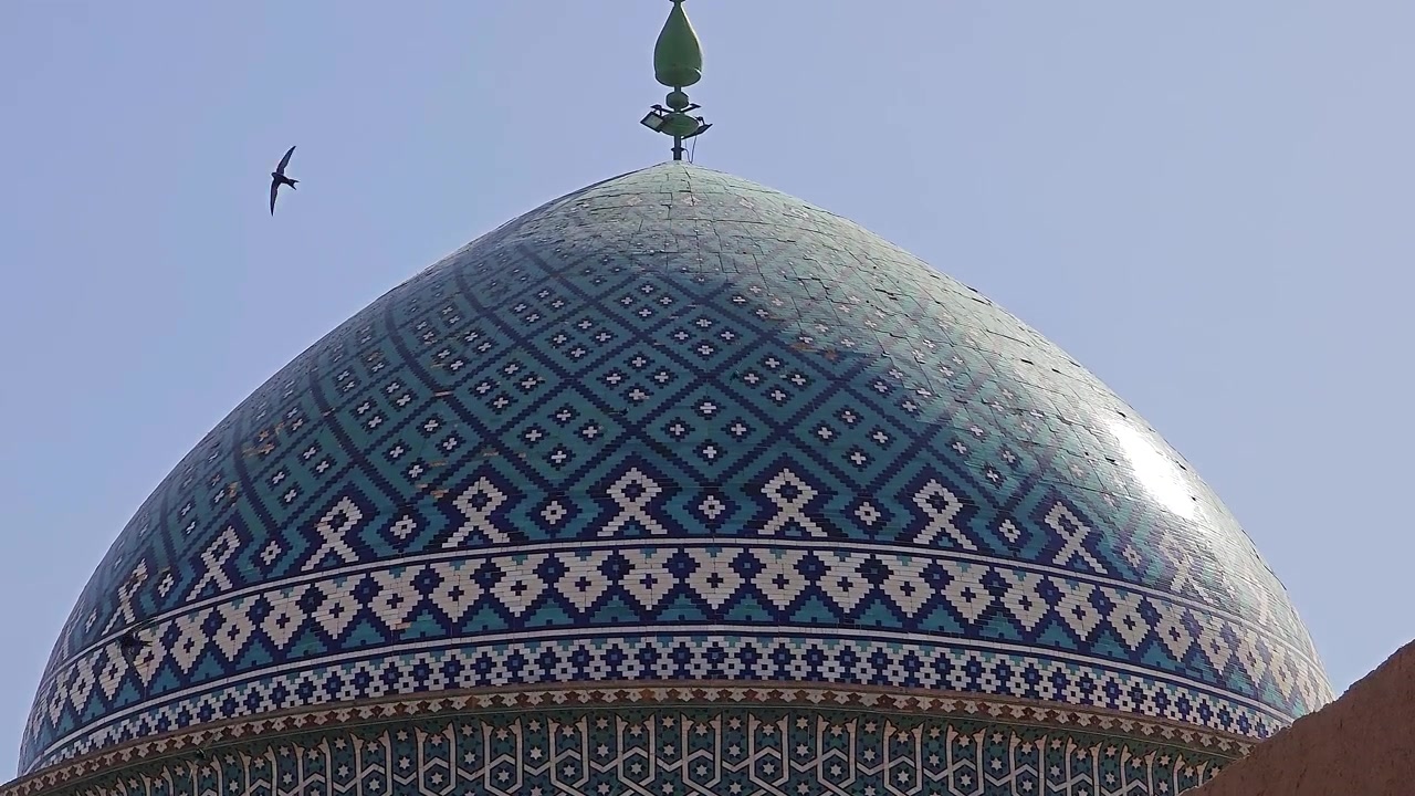 Intricate Blue Tiled Dome of a Traditional Persian Mosque