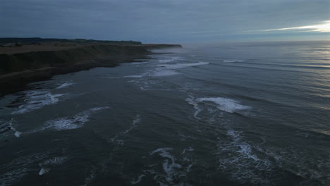 Descending-Establishing-Aerial-Drone-Shot-of-Cleveland-Way-on-Misty-Morning-at-Blue-Hour