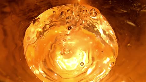 slomo shot of water being poured into glass