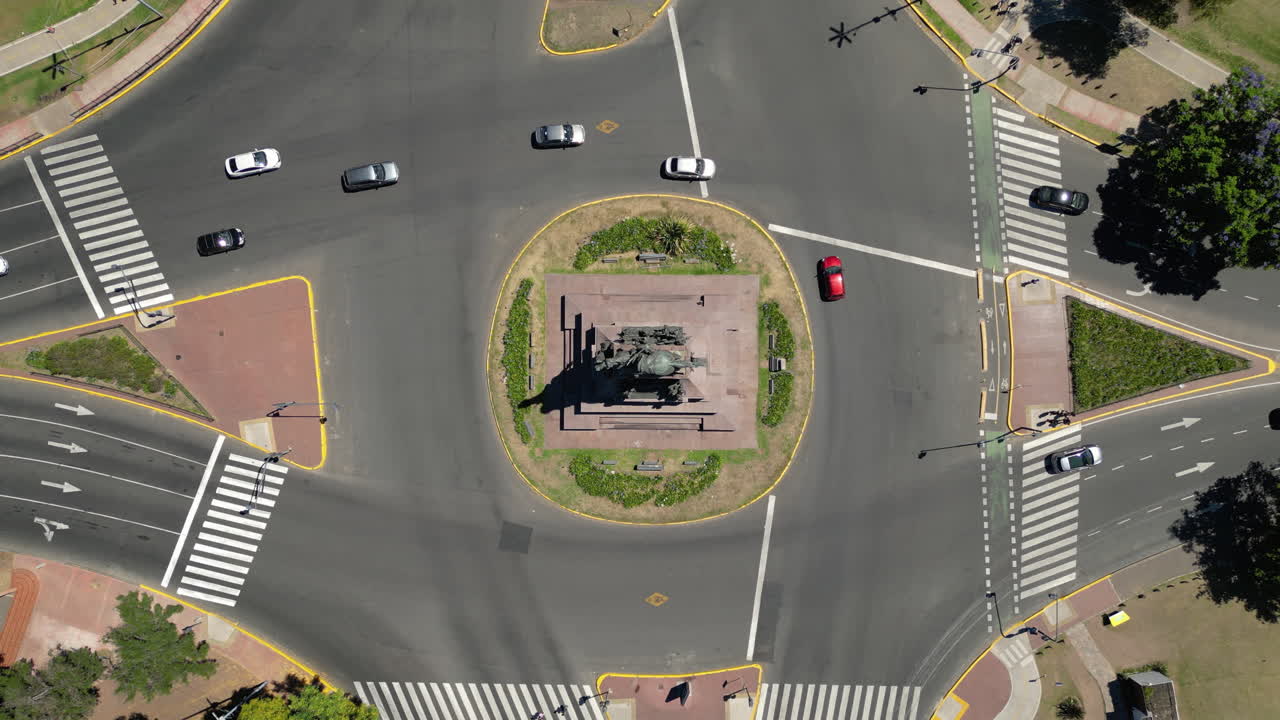 Aerial Time Lapse of Busy City Roundabout with Equestrian Statue