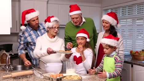 three generation family baking together at christmas time