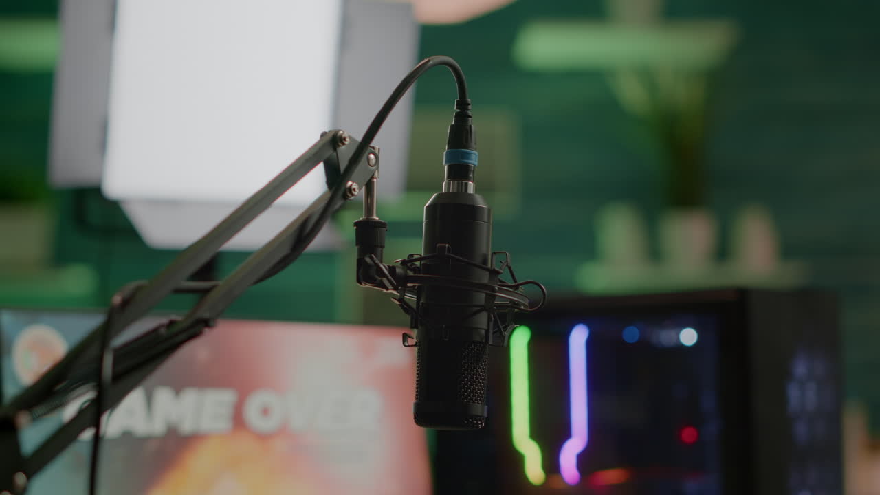 Streaming professsional microphone in empty gaming home studio