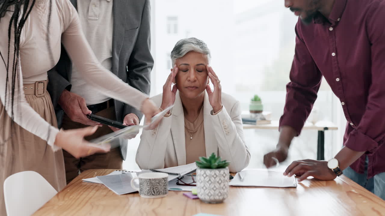 Headache, chaos and business woman