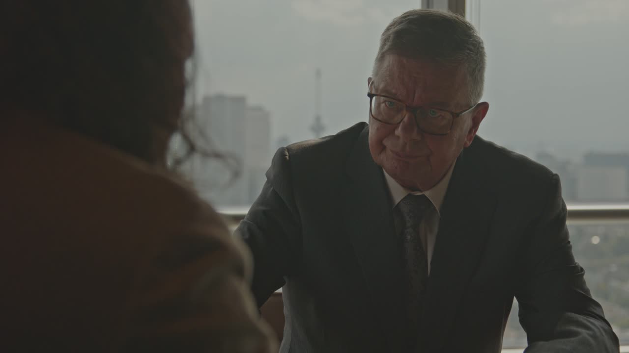 Serious Business Meeting: A Man and Woman Discuss Important Matters