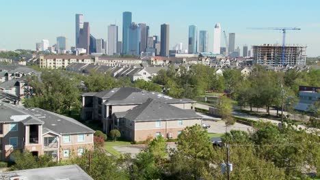 a suburban area of houston with the downtown distant 1