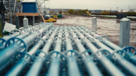 closeup-panning-shot-of-metal-scaffold-poles-and-equipment