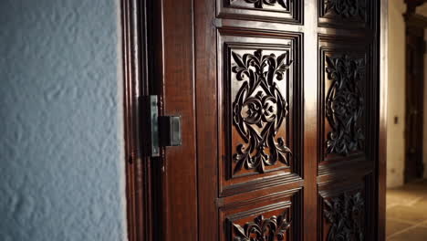 ornate carved wooden door
