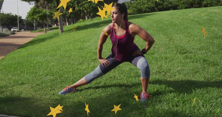 Health enthusiast stepping onto lawn starting side lunge stretching with stars showing muscle tone