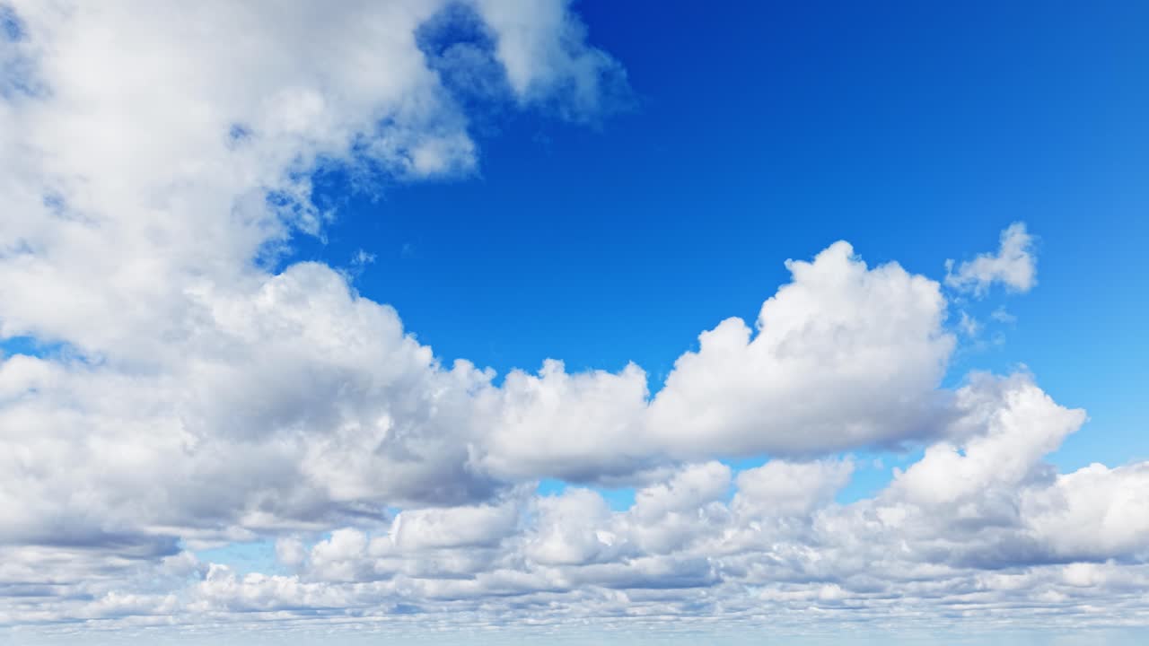 Timelapse of fluffy white clouds moving across a bright blue daytime sky