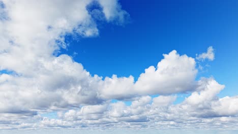 timelapse of fluffy white clouds moving across a bright blue daytime sky