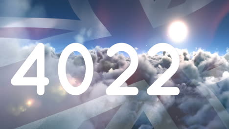 animation of counter over clouds and flag of united kingdom