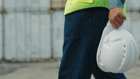 construction worker carrying safety helmet