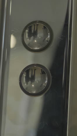 close-up of elevator buttons