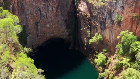 the tolmer falls seen from above in litchfield national park in australia - aerial drone shot