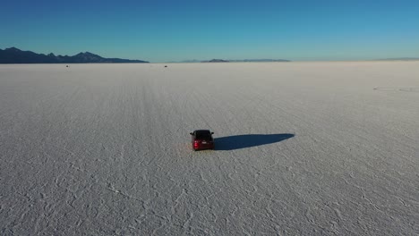 Car-Drives-through-salt-flats