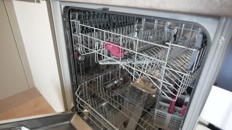 empty stainless steel dishwasher