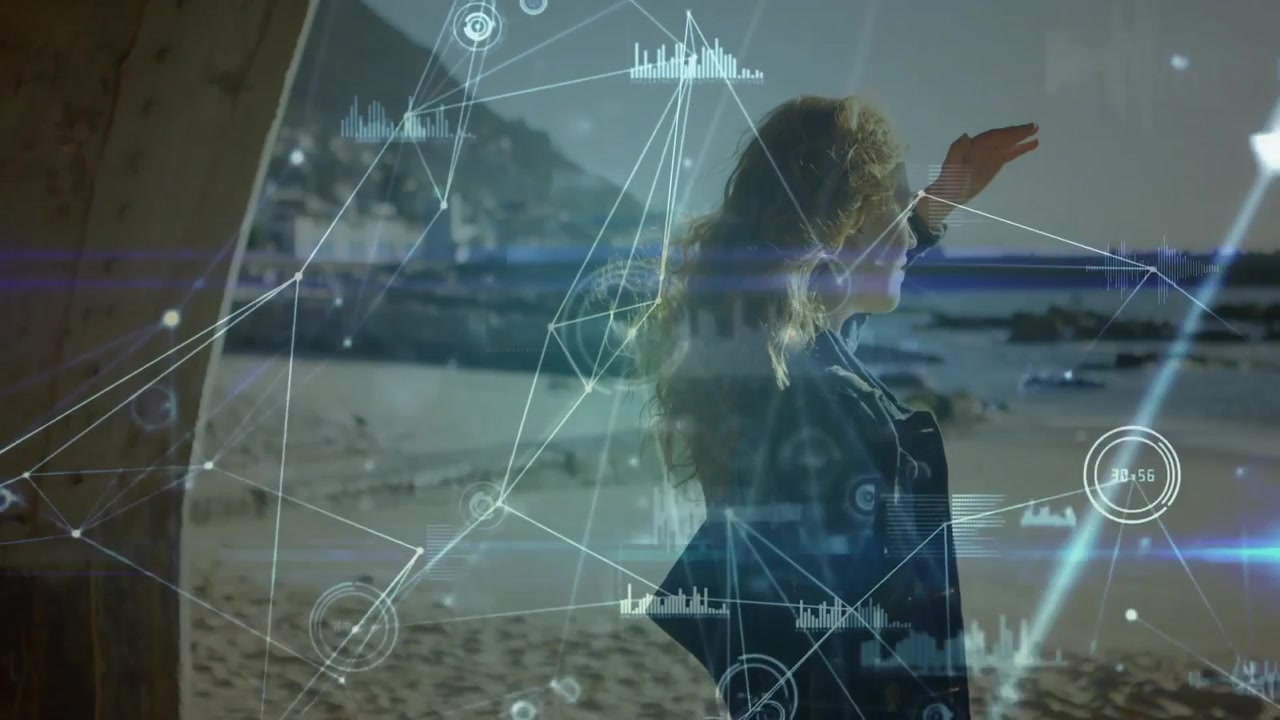 Kvinde ser på havet med digital dataoverlejring