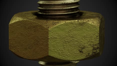 rotating gold and rusted nut on dark background.