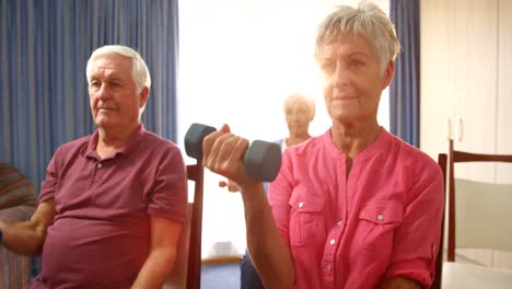 Group-of-senior-people-exercising-with-dumbbells