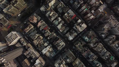 downward high altitude reveal of skyscrapers in hong kong