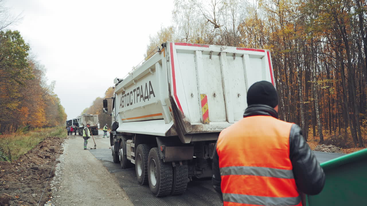 Construction and repair of highway. Road working on the new road construction site