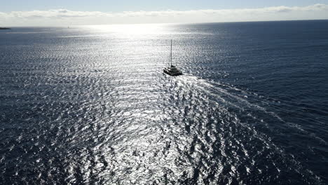 aerial rotation of sailboat near kauai on clear day